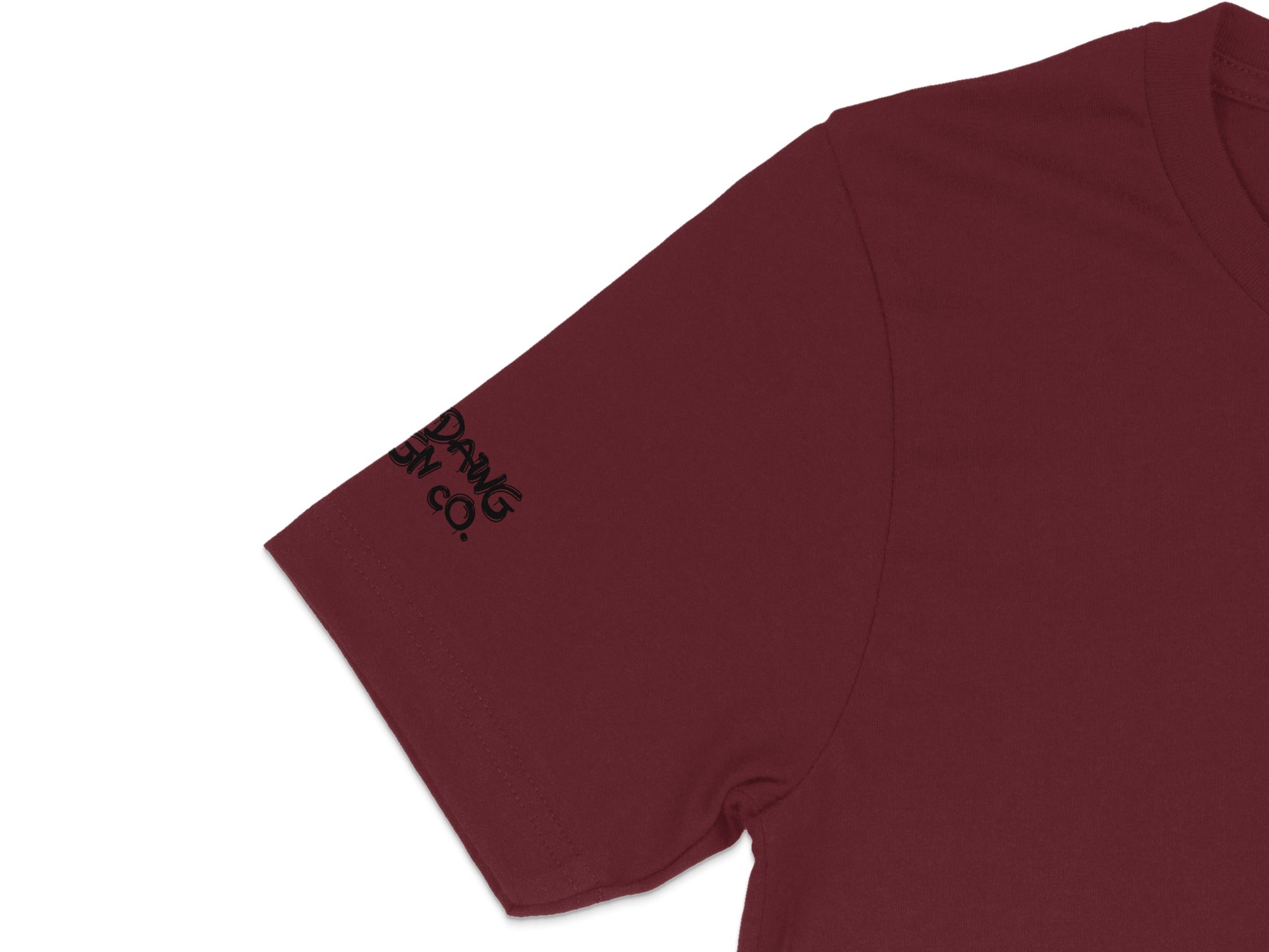 Dramatic Burgundy Tee with Subtle Text on Sleeve